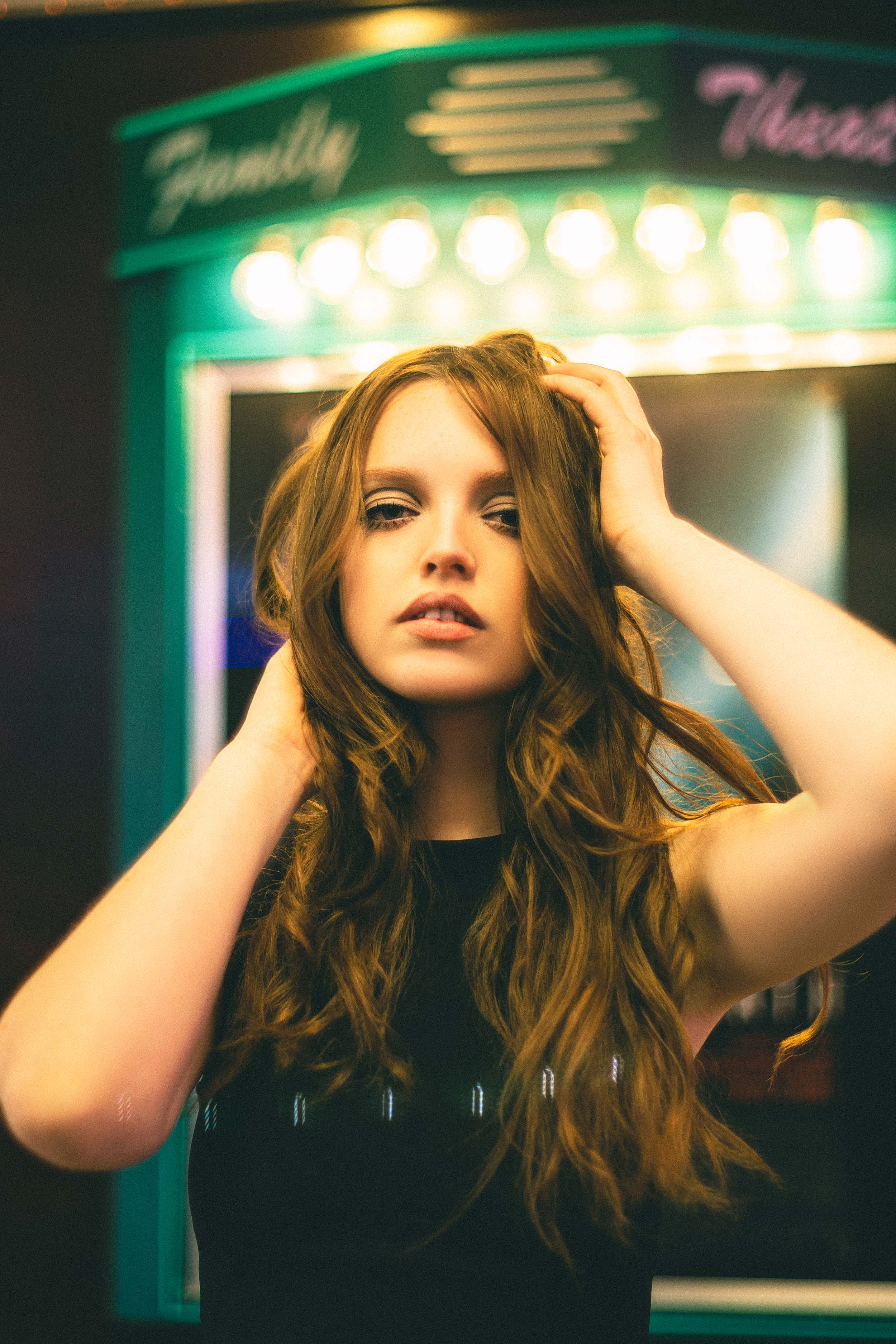 Cinematic Portraits with Vintage Flair by a Movie Theater — photograph 3 of 35